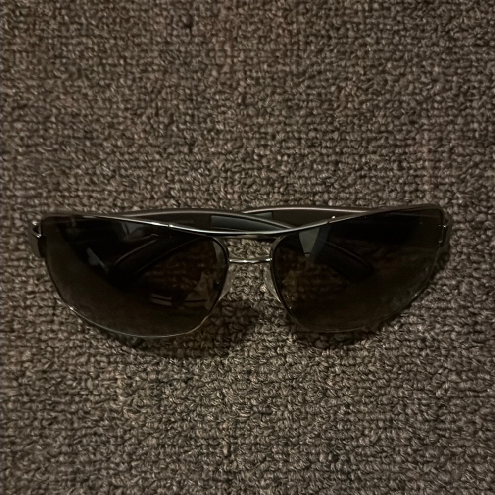 Prada Brown Glass Sunglasses Sleek Wraparound Design